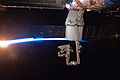 Dextre inspecting Dragon's trunk on 27 May 2012