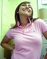 Image 38Woman wearing a polo shirt with a popped collar. (from 1990s in fashion)