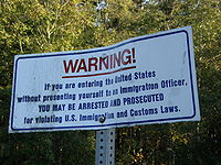 Notice at the international boundary between Canada and the United States in Point Roberts