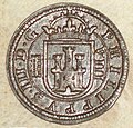 Reverso de moneda de 8 maravedís (cobre) de Felipe III con "ceca" de Segovia del año 1607.