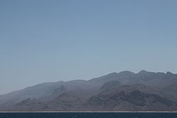 View of Murcanyo town at the foot of the Jebel Murcanyo mountains