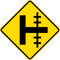 (W15-1.1/PW-13.1) Railway level crossing on side road to right
