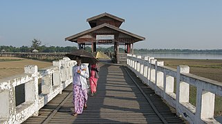 U Bein Bridge, Women with umbrellas, Amarapura, Mandalay, Myanmar.jpg