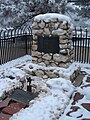 His grave near Denver