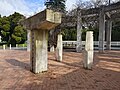 Opposite side view of Justice (1999) by Fred Graham, showing the pieces of wood