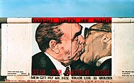 My God, Help Me to Survive This Deadly Love, Leonid Brezhnev and Erich Honecker in a fraternal embrace, reproducing a photograph that captured the moment in October 1979 during the 30th anniversary celebration of the foundation of the German Democratic Republic