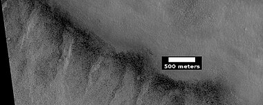 Possible backwash channels that may have been created by a tsunami, as seen by HiRISE under HiWish program