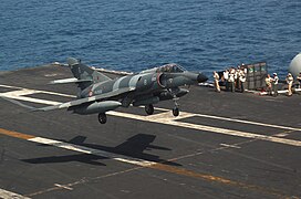 US Navy 070412-N-7498L-018 A French Super-Etendard from the nuclear-powered aircraft carrier French Navy Ship Charles de Gaulle (R 91) performs a touch-and-go landing on the flight deck of the Nimitz-class aircraft carrier USS.jpg