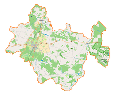 Mapa konturowa powiatu radomszczańskiego, blisko centrum na prawo znajduje się punkt z opisem „Trzebce”