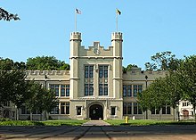 Large academic building with an arch