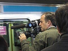 Televisión Española camera crew shoots a Keihintohoku Line train at Tokyo Station 20131205.jpg