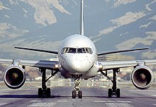 Forward view of aircraft, showing fuselage profile, two circular engines.