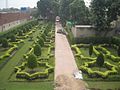 The site features formal gardens.