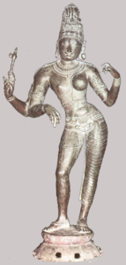Bronce de la dinastía Chola: el dios Sivá na forma de Ardhanarīśvara (metá Sivá, metá Parvati, la so muyer).