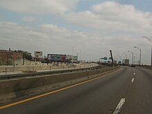 Driver's view of a four-lane divided highway under construction