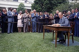 President Gerald R. Ford Signing H.R. 6219, Extending the Voting Rights Act of 1965, at a Ceremony in the Rose Garden - NARA - 23898507.jpg