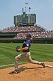 Image 51Chris Young winding up for a four-seam fastball in the bullpen while warming up before a 2007 game. Behind Young can be seen the Wrigley Field scoreboard and bleachers. Image credit: TonyTheTiger (photographer) and Jjron (editing) (from Portal:Illinois/Selected picture)