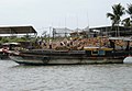 Vận chuyển vỏ dừa trên sông Tiền ở Bình Đại, Bến Tre.