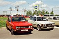 Škoda 120 GLS in rot neben einem BMW E21 in Russland