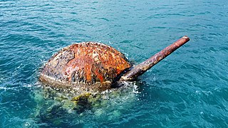 Cañón González Hontoria de 28 cm en el pecio del crucero Vizcaya.