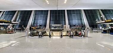 Escalators near departure zones 3 and 4 at Dulles International Airport.jpg