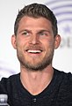 Travis Van Winkle interpreta Danny Green