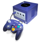 Purple Nintendo GameCube + controller.