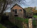 Stretton Mill and steps, millrace and sluice adjoining