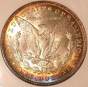 Iridescent toning on the reverse of a Morgan dollar