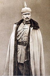 Kaiser Wilhelm II. mit nutriagefüttertem Cape (1914)