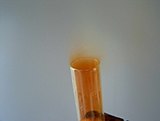Nitrogen dioxide being released from a test tube