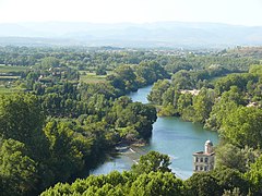 View from Béziers to the river Orb showing a weir and the Ancien Moulin de Bagnols