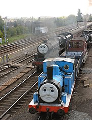 Thomas, Henry and Duck steam locomotives.