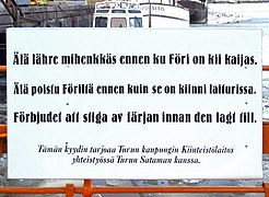 Табличка с предупреждающей надписью на туруском диалекте финского языка, на литературном финском и на шведском языках