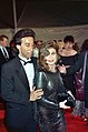 Image 79Actress Paula Abdul wearing semi-transparent black dress, curled hair and smoky eye makeup, 1990. (from 1990s in fashion)