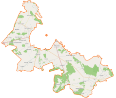 Mapa konturowa gminy wiejskiej Łomża, blisko dolnej krawiędzi nieco na prawo znajduje się punkt z opisem „Modzele-Skudosze”