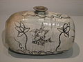 Drum-shaped bottle with decoration of fish, bird, and lotus