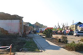 Moravská Nová Ves: zdemolované a poškozené domy na náměstí Republiky
