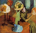 Chez la modiste, Degas