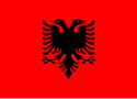 Red flag with a black double-headed eagle in the center.