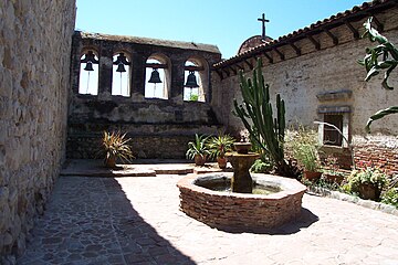 Fountain and mission remains of the San Juan Capistrano Mission, California, one of nine missions founded by Spanish Franciscan missionaries led by Fray Junípero Serra in the 1770s. Serra led the Spanish colonization of what is today the state of California.