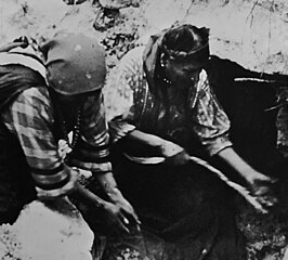 Julian and Maria Martinez digging clay in the early 1920s