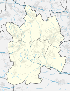 Mapa konturowa powiatu mikołowskiego, blisko centrum na prawo znajduje się punkt z opisem „Wilk Elektronik S.A.”