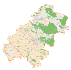 Mapa konturowa powiatu oławskiego, blisko centrum u góry znajduje się punkt z opisem „Siedlce”