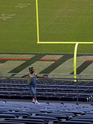 A child waits for her evacuation orders to end and wonders whether she still has a home. Qualcomm Stadium, San Diego wildfires of 2007. Taken 24 October 2007.