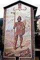 Affresco dedicato a San Maurizio, in piazza del mercato, con il motto « en adversité, bon cœur » (= nell'avversità, buon cuore), aggiunta allo stemma della città nel 1565 dal duca Emanuele Filiberto di Savoia