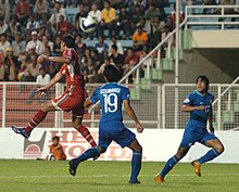 Mr. Mukhanov of Tajikistan chasing with Shri Gourmangi of India during the final of Asian Football Confederation Challenge Cup between India and Tajikistan at Ambedkar Stadium, in New Delhi on August 13, 2008.jpg