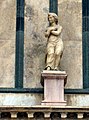 Angel, small statue over the right entrance