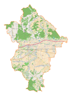 Mapa konturowa powiatu łańcuckiego, w centrum znajduje się ikonka pałacu z opisem „Zamek Lubomirskich i Potockichw Łańcucie”