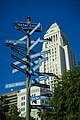 City Hall tower, with sister cities street sign in foreground.